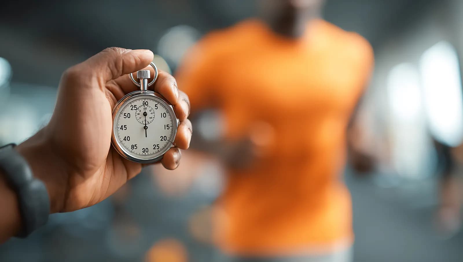 person doing 30 minute workout at gym with dumbbells and timer clock